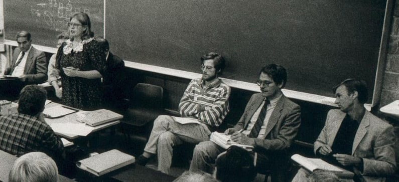 The founding meeting of BIEN in Louvain-la-Neuve (Belgium), 1986. From left to right on stage: Riccardo Petrella, Greetje Lubbi, Anne Miller, Nic Douben, Philippe Van Parijs, Claus Offe, Bill Jordan.